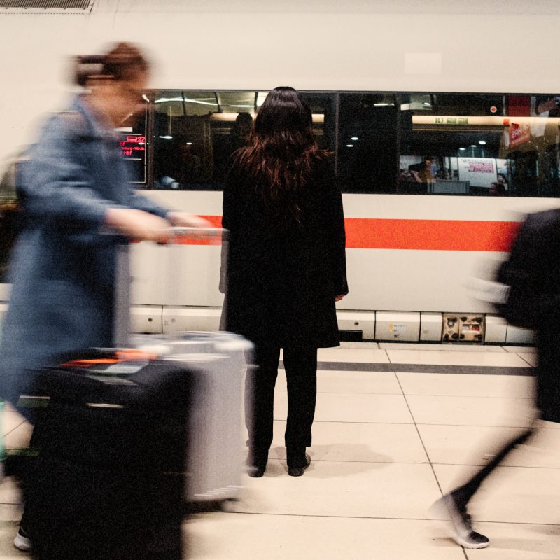 A refugee woman arrives at a train station