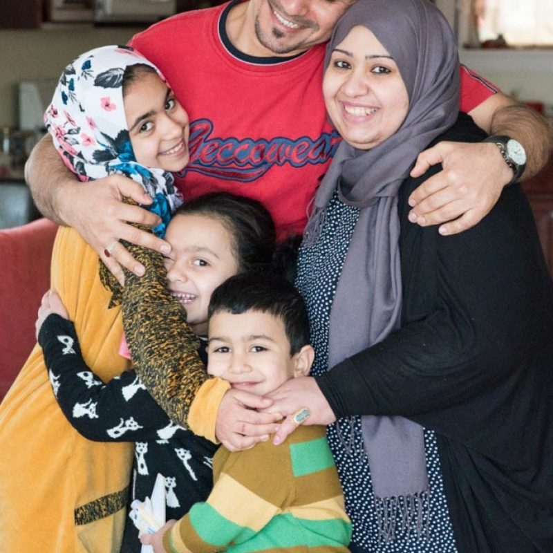 Mohaned and Zainab with their family